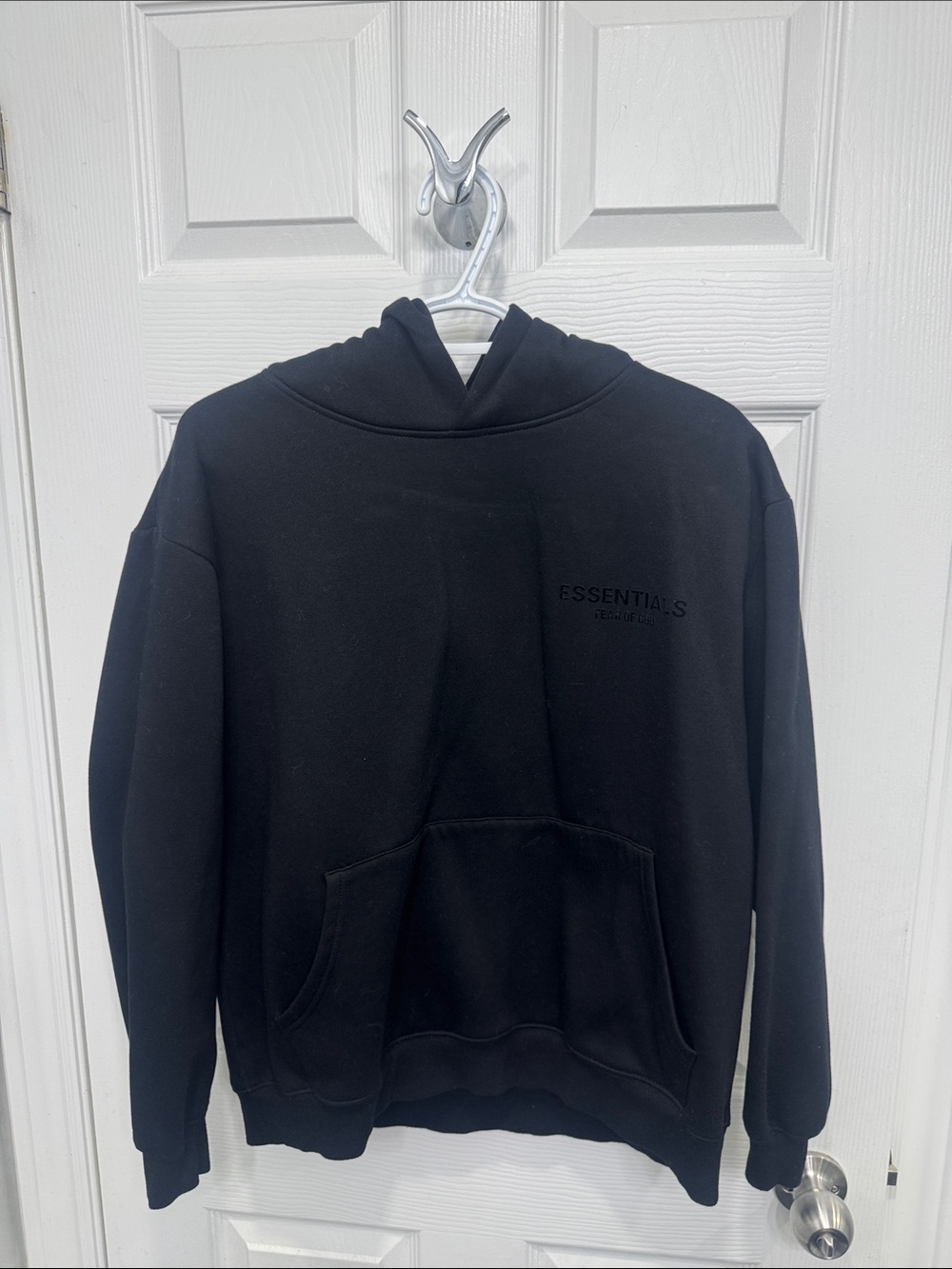 Essentials Black Pullover Hoodie with Subtle Logo